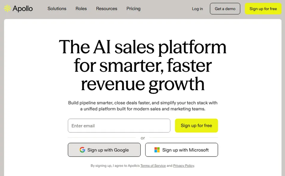A screenshot of the Apollo AI sales platform homepage. The page features the headline 'The AI sales platform for smarter, faster revenue growth' and an input field to 'Enter email' with a 'Sign up for free' button. Users can also sign up with Google or Microsoft.