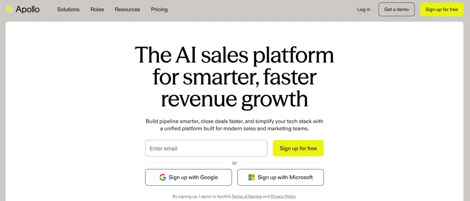 This is a screenshot of the Apollo homepage, an AI sales platform. The page features the company logo, navigation links, a headline 'The AI sales platform for smarter, faster revenue growth', a short description, an email input field with a 'Sign up for free' button, and options to sign up with Google or Microsoft.