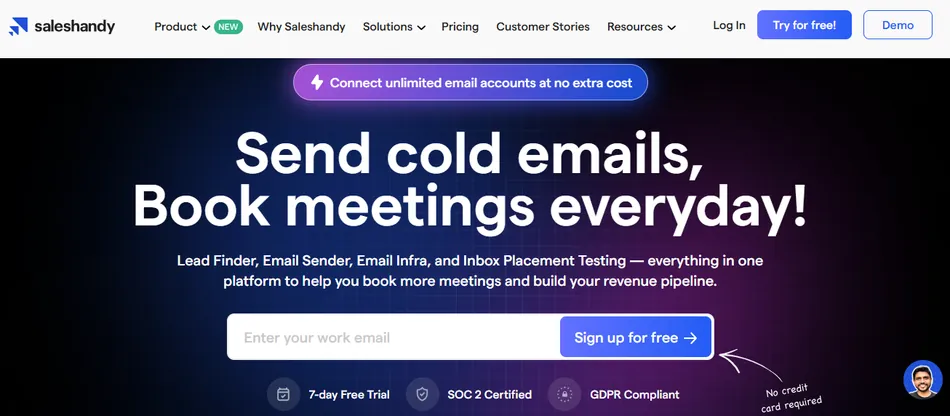 A screenshot of the Saleshandy website homepage, featuring a dark blue and purple gradient background with a grid pattern. The main text reads Send cold emails, Book meetings everyday. Below it, there is a text field that says Enter your work email and a blue button that says Sign up for free with an arrow. There are also smaller icons and text indicating 7-day Free Trial, SOC 2 Certified, and GDPR Compliant, and a note stating No credit card required. At the top, a navigation bar shows Saleshandy logo, Product, Why Saleshandy, Solutions, Pricing, Customer Stories, Resources, Log In, Try for free, and Demo buttons. A banner at the top of the main section says Connect unlimited email accounts at no extra cost. A small circular profile picture of a person is in the bottom right corner.