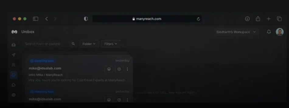 A dark mode screenshot of a ManyReach email interface, within a web browser, showing an inbox with two emails from mike@idealab.com about Cold Email Experts at ManyReach. The browser's address bar displays manyreach.com and the interface shows options for filtering and managing emails.