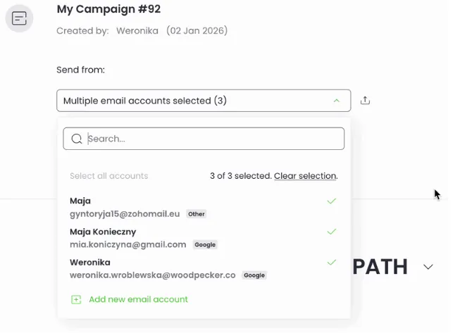 A screenshot displays a web interface for managing email campaigns. The title 'My Campaign #92' is visible, indicating it was created by Weronika on January 2, 2026. A dropdown menu is open under 'Send from' showing 'Multiple email accounts selected 3'. Inside the dropdown, there is a search bar, options to 'Select all accounts' or 'Clear selection', and a list of three selected email accounts, including Maja's zoho.eu account labeled 'Other', Maja Konieczny's gmail.com account labeled 'Google', and Weronika's woodpecker.co account labeled 'Google'. An option to 'Add new email account' is at the bottom.