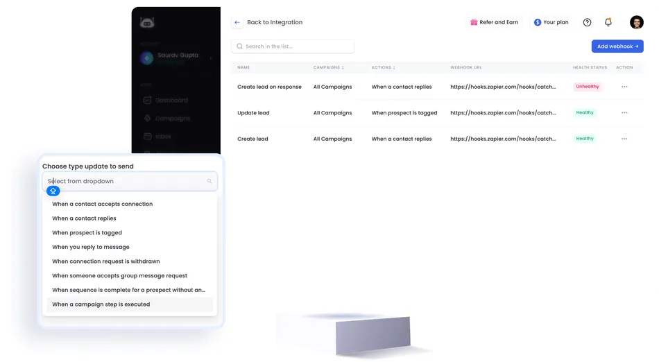 A screenshot of a web application showing an integration dashboard with a list of webhooks. On the left is a sidebar menu with account details for Saurav Gupta, showing 'Connected,' and menu items like Dashboard, Campaigns, and Inbox. A popup is overlaid on the left, titled 'Choose type update to send,' with a dropdown menu and options like 'When a contact accepts connection,' 'When a contact replies,' and 'When a campaign step is executed.' The main dashboard area lists webhooks with details like 'Name,' 'Campaigns,' 'Actions,' 'Webhook URL,' and 'Health Status,' which are either 'Unhealthy' or 'Healthy.' There is a button at the top right labeled 'Add webhook.'