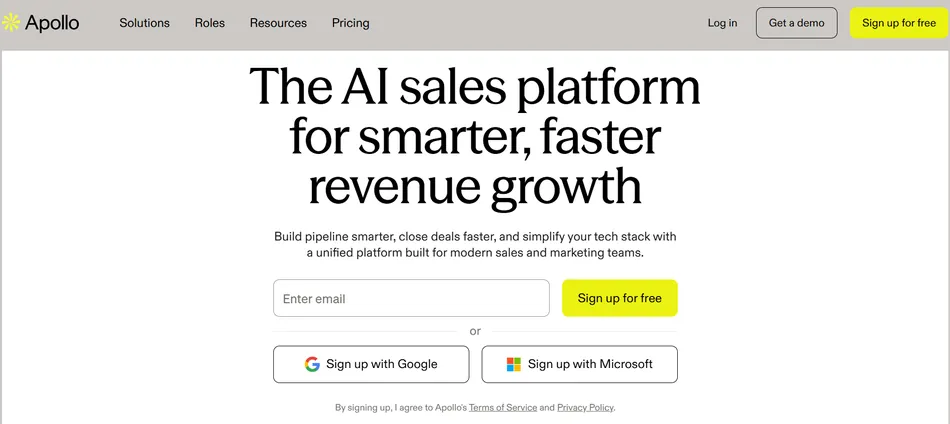 A screenshot of the Apollo website's homepage, featuring the headline The AI sales platform for smarter, faster revenue growth. Below, there's an email input field and buttons to sign up for free or sign up with Google or Microsoft.